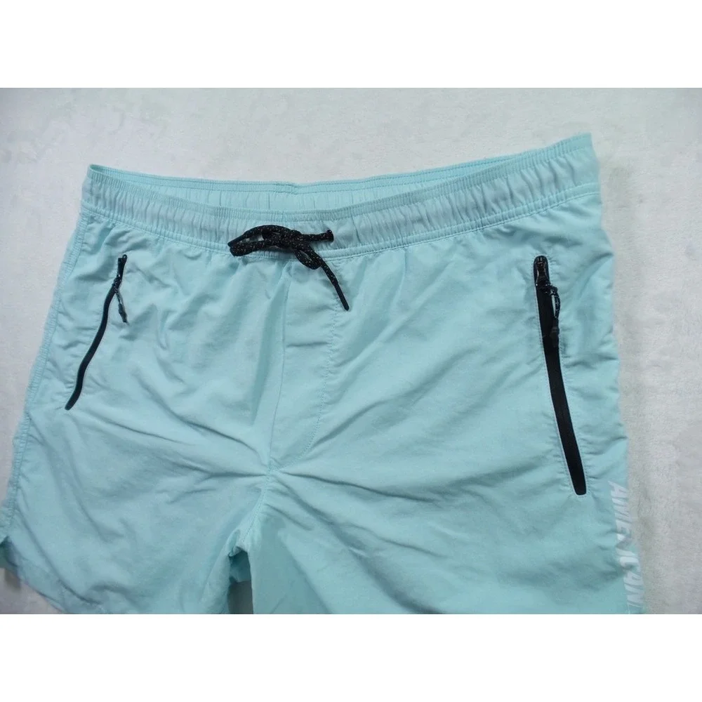 American Eagle Shorts Mens Large Blue Swim Trunks Zip Pockets Drawstring Stretch